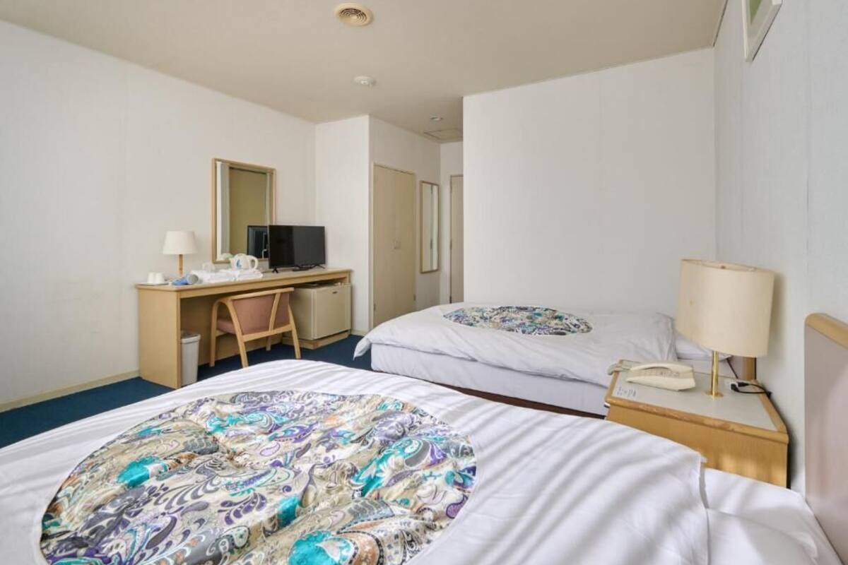 Chambre avec lits jumeaux, non-fumeurs | Bureau, Wi-Fi gratuit, draps fournis