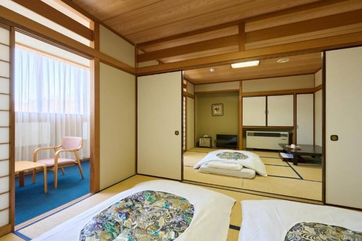 Chambre quadruple de style japonais | Bureau, Wi-Fi gratuit, draps fournis