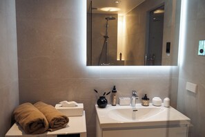Hair dryer, towels, toilet paper