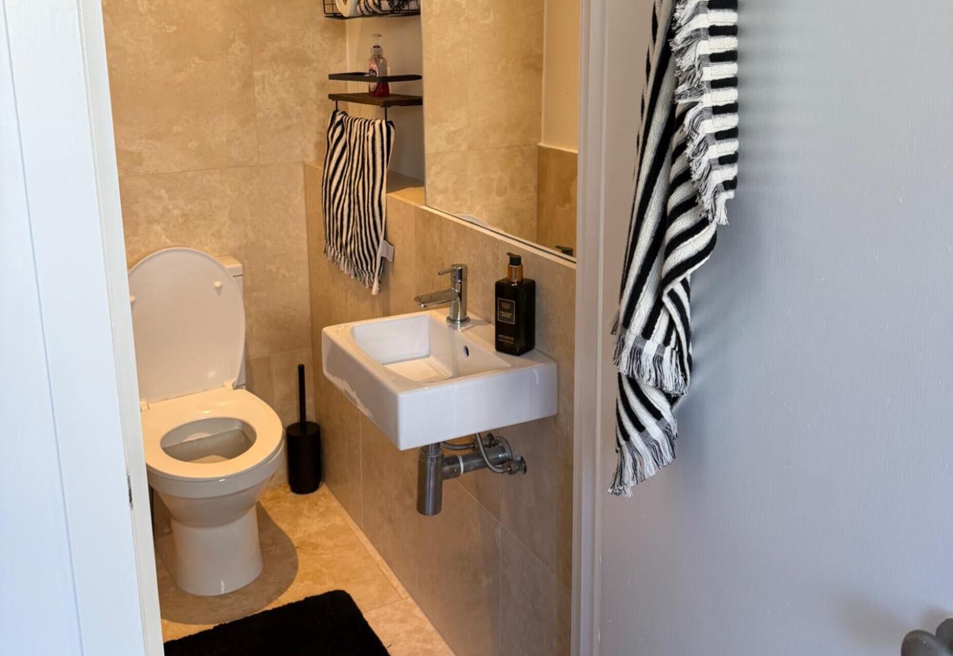 Combined shower/bathtub, deep-soaking bathtub, hair dryer, towels