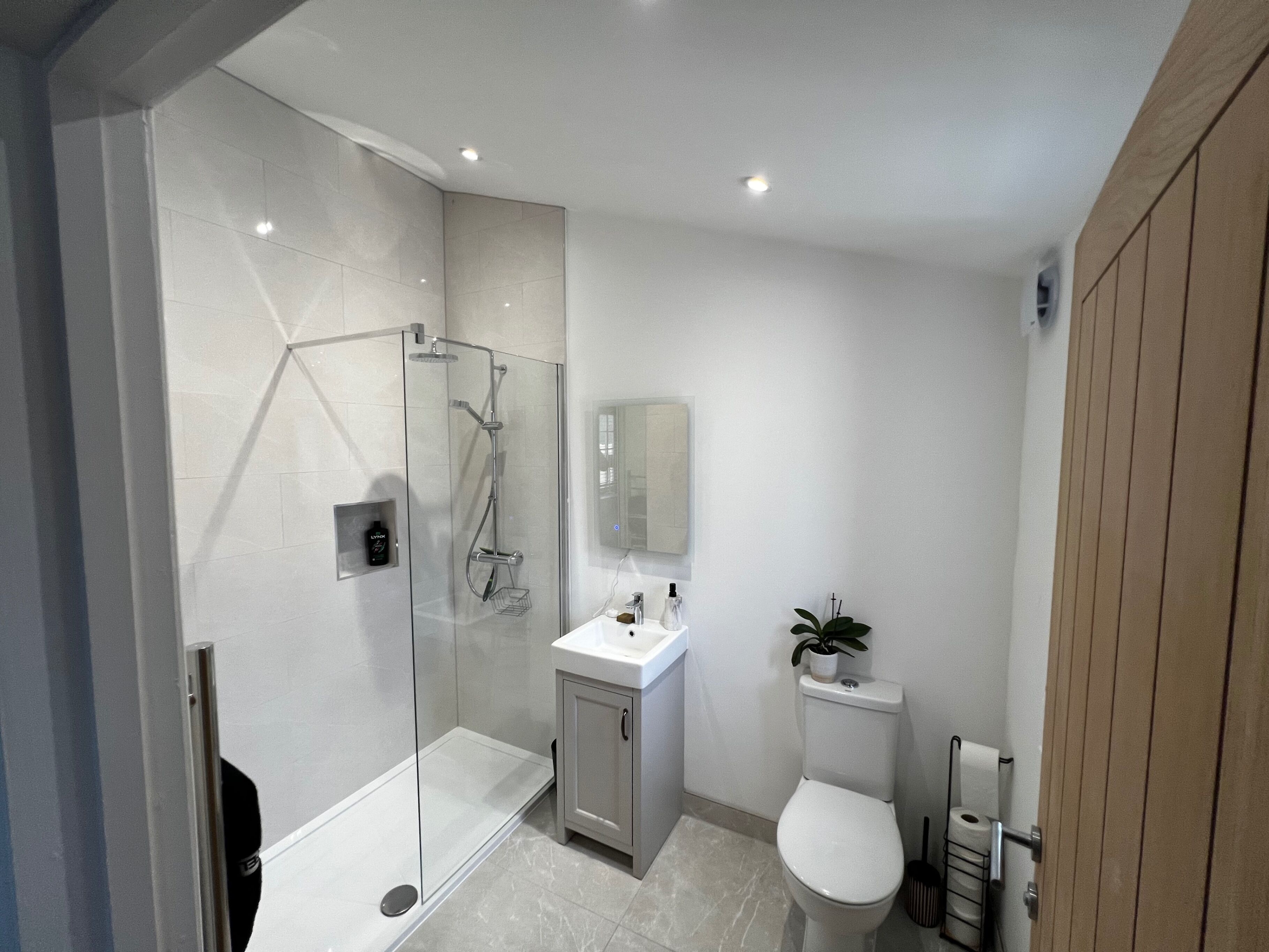 Shower, deep soaking tub, hair dryer, towels