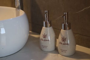 Hair dryer, towels, soap, shampoo