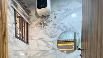 Shower, bidet, towels, soap