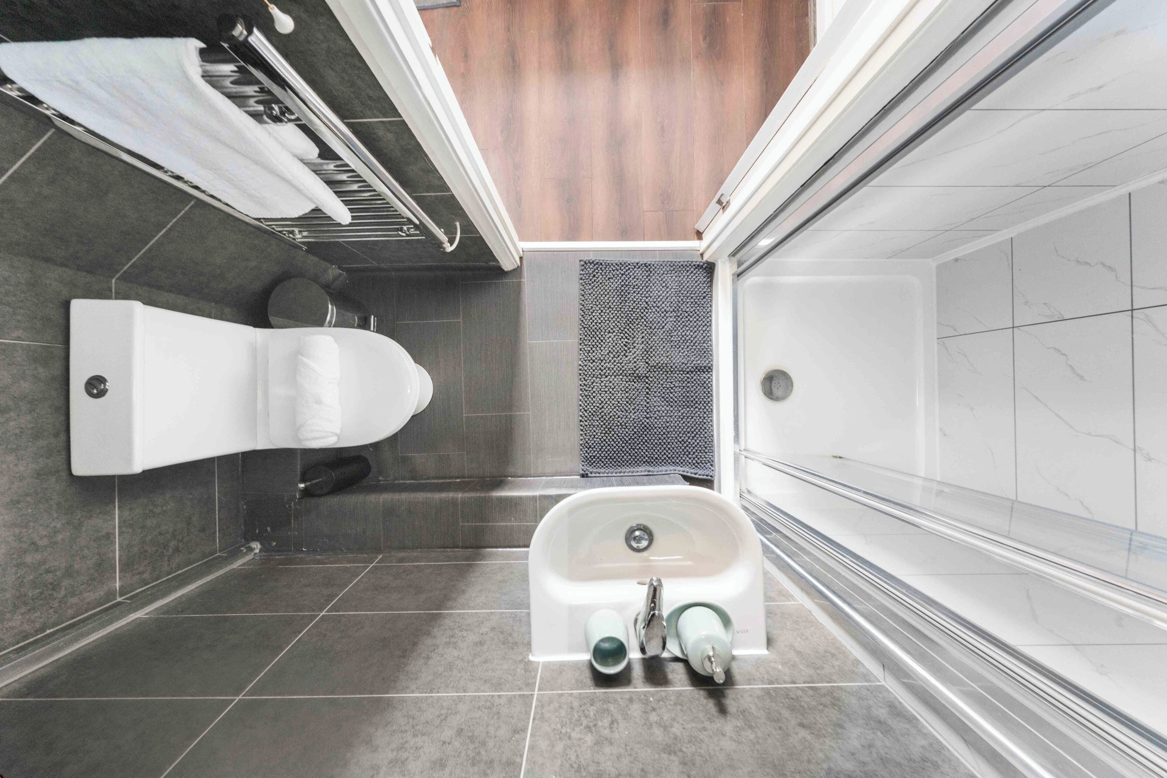 Shower, eco-friendly toiletries, hair dryer, towels
