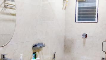 Triple Room, City View | Bathroom | Shower, towels, soap, shampoo