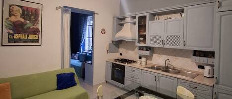 Apartamento conforto, cozinha | Área de estar