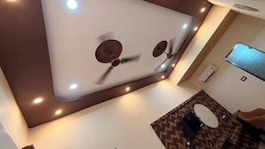 Habitación cuádruple Deluxe | Interior