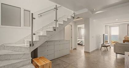 Vacation Apartment 'The Cliff View B' with Sea View, Private Terrace and Wi-Fi