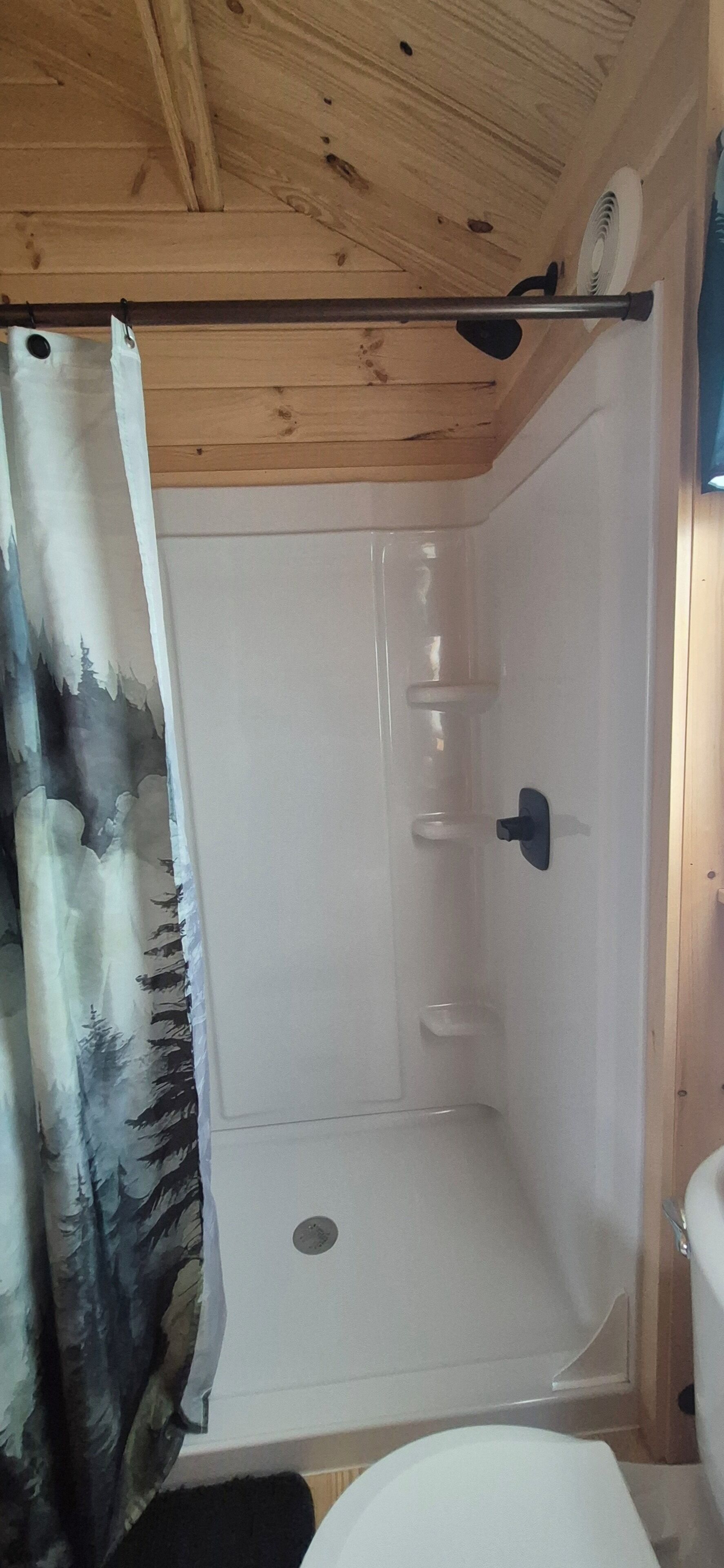 Shower, towels, soap, toilet paper