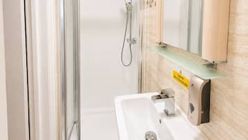 Comfort Double Room | Bathroom | Shower, free toiletries, towels, soap