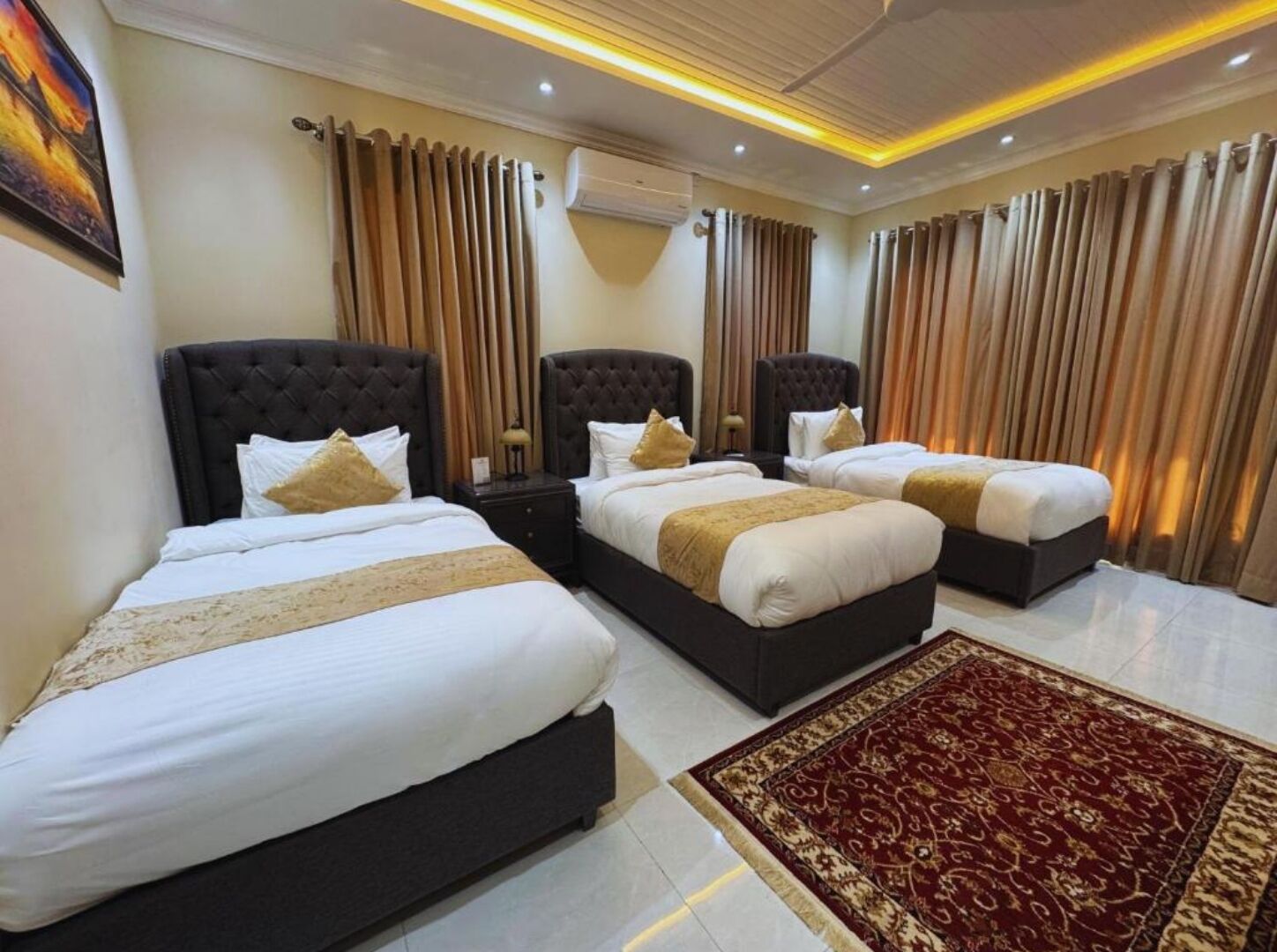 Habitación triple | Ropa de cama de alta calidad y sistema de insonorización