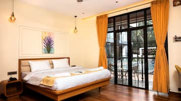 Habitació Deluxe | Llençols de cotó egipci, roba de llit d'alta qualitat i cobrellits