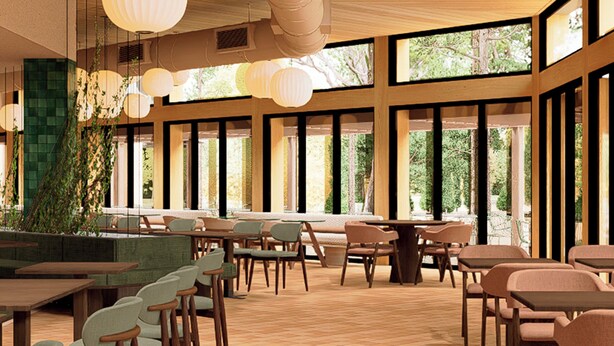 A spacious indoor area with multiple seating arrangements, large windows, and hanging light fixtures. - Aura By Aubamar (Palma de Mallorca)