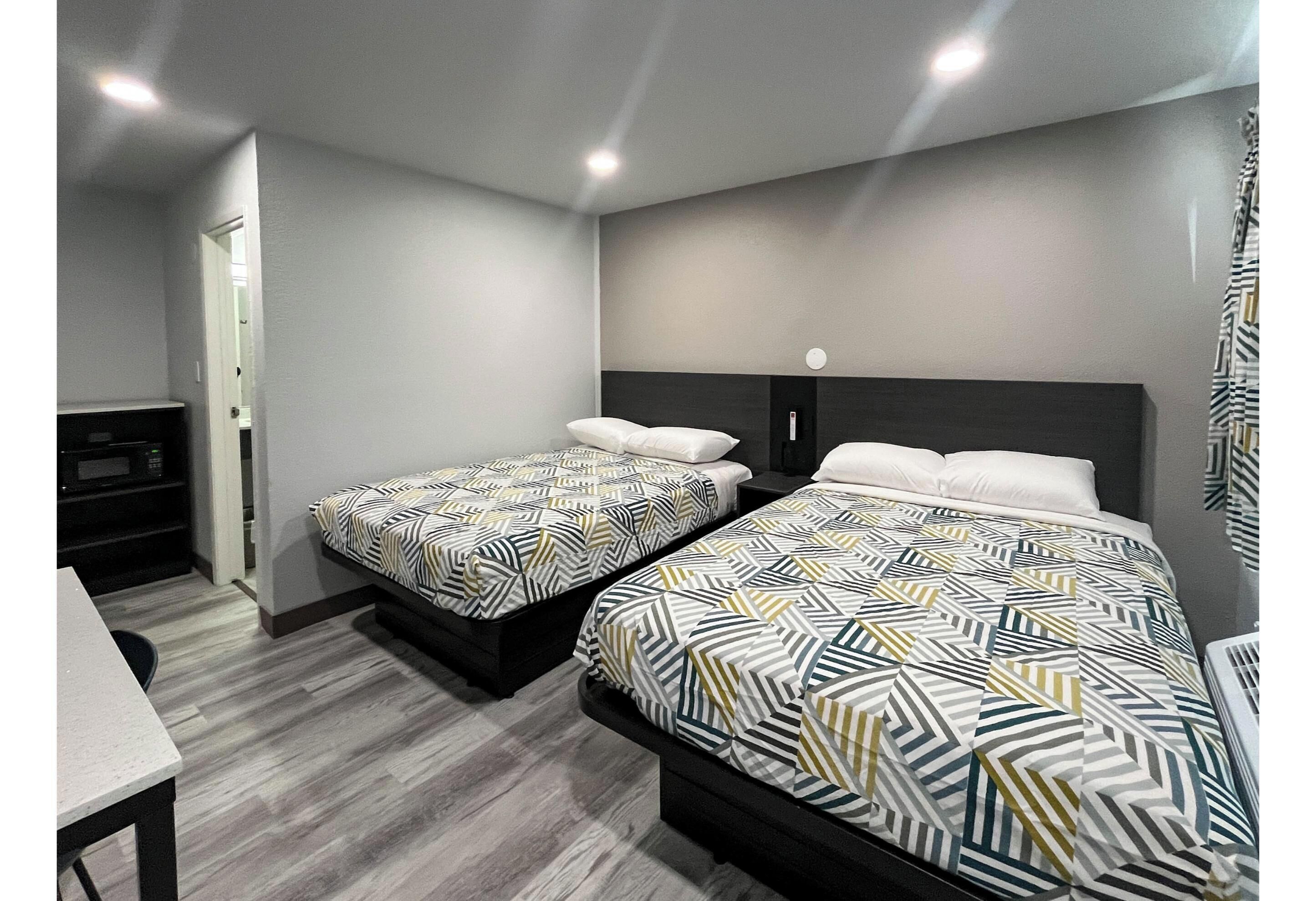 Deluxe Room, 2 Double Beds, Non Smoking, Refrigerator (Mircowave) | Free WiFi, bed sheets