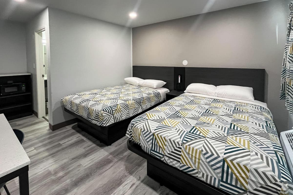 Deluxe Room, 2 Double Beds, Non Smoking, Refrigerator (Mircowave) | WiFi (free), bed sheets