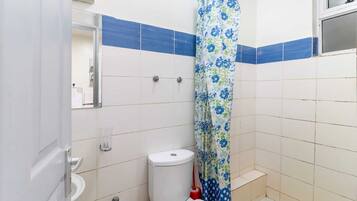 Classic Studio | Bathroom | Free toiletries, slippers, towels, soap