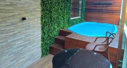 Apartment with hot tub, heater, and dry sauna.