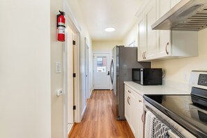 Dúplex superior, no fumadores, patio | Cocina privada
