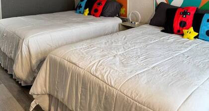 Mario-Themed Hotel Room • 2 Queen Beds •