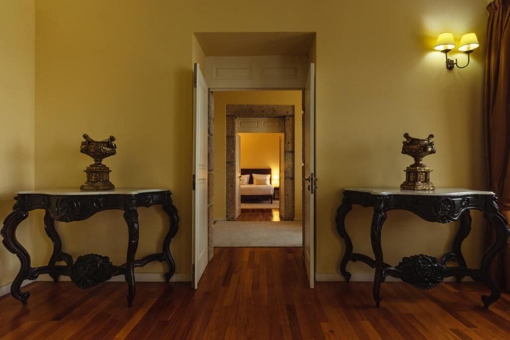 Suite Deluxe, balcón, vista al jardín | Interior