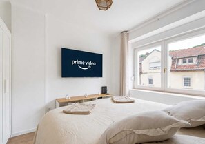 1 dormitorio, tabla de planchar con plancha, cuna de viaje y wifi gratis
