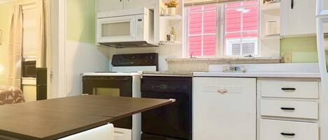 Coffee/tea maker, fridge, microwave, oven