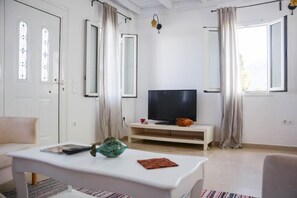 Apartamento superior | Área de estar
