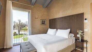 Deluxe Apartment, Hill View | In-room safe, desk, laptop workspace, blackout drapes