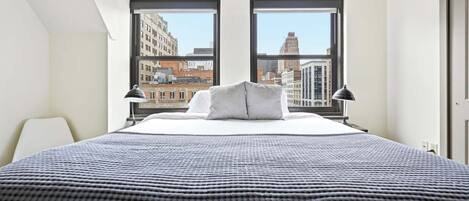 Iron/ironing board, travel crib, WiFi (free), bed sheets