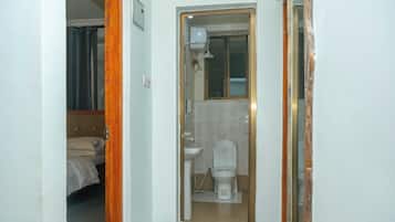 Shower, bidet, towels, soap