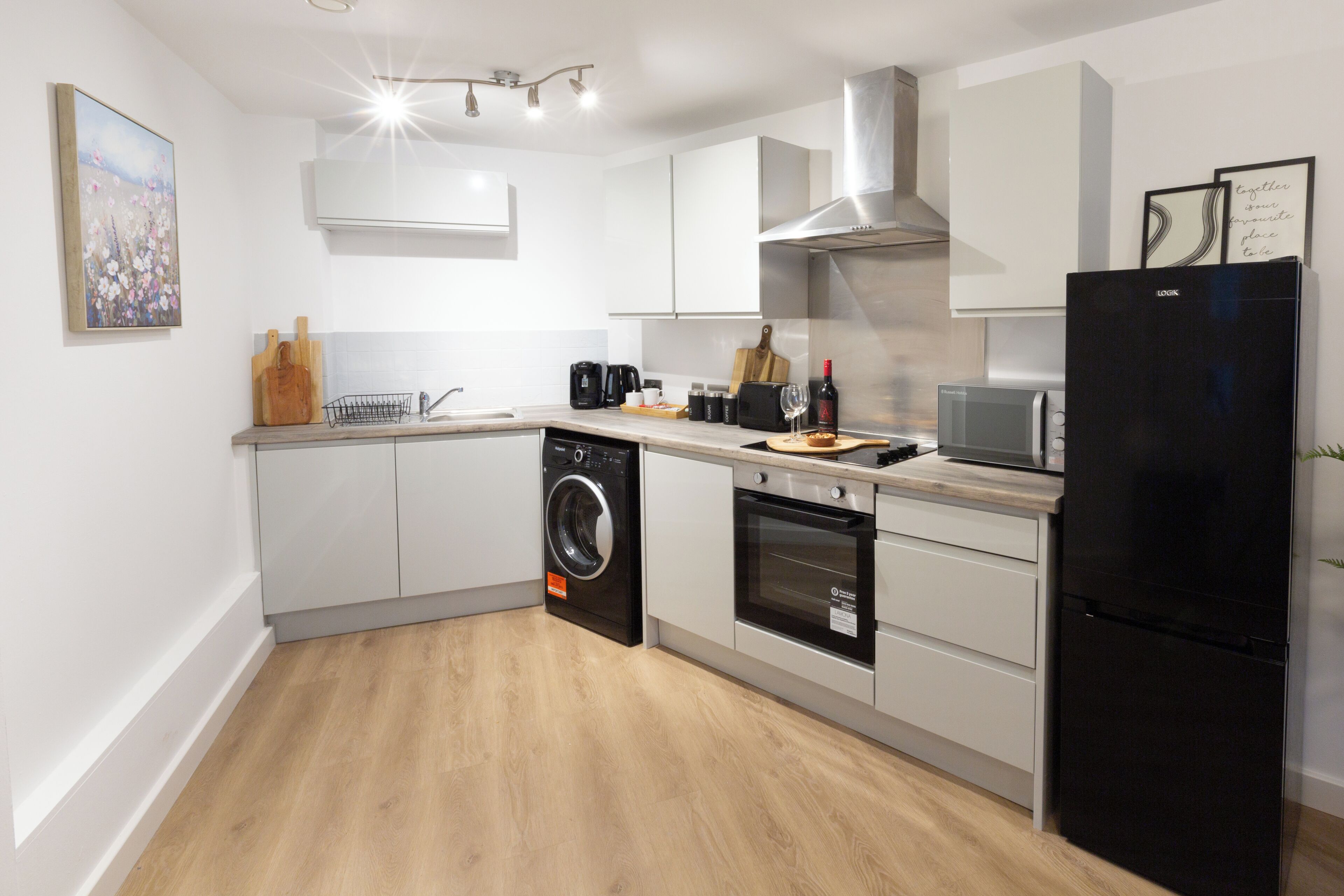 Coffee/tea maker, fridge, microwave, oven