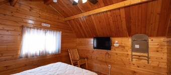 Rustic Cabin (Sleeps 2) - The Camping Cabin sleeps a maximum of 2. Bring your own linens.