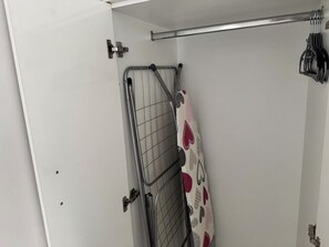 A room with a metal gate, a towel rack, and a curtain with a pattern. - Jet lag by the Sea Stylish House close toAthens airport,Rafina port, Ahens (Artemis)