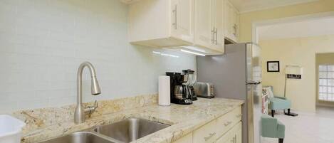 Coffee/tea maker, fridge, microwave, oven
