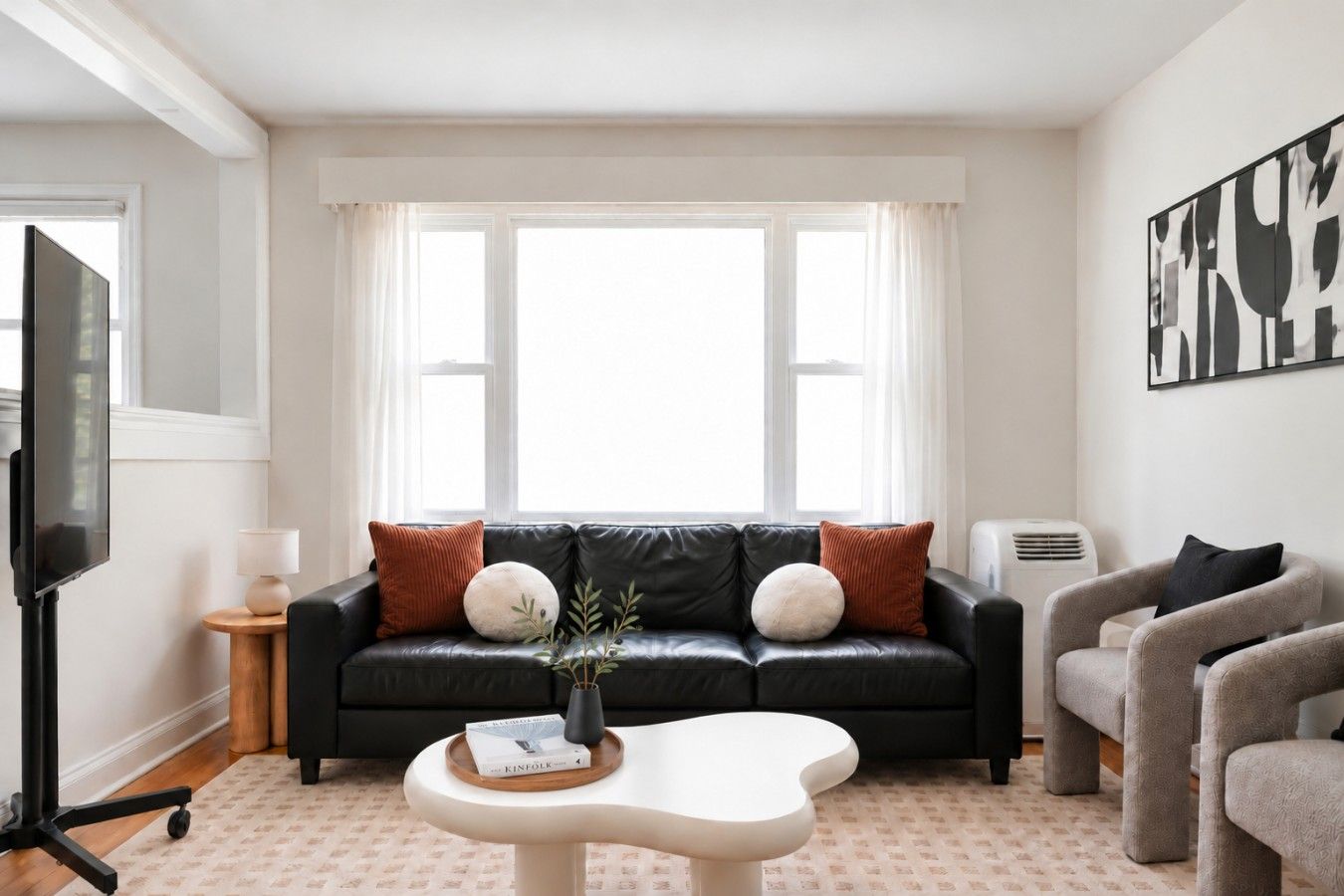 Living room with sofa and armchairs