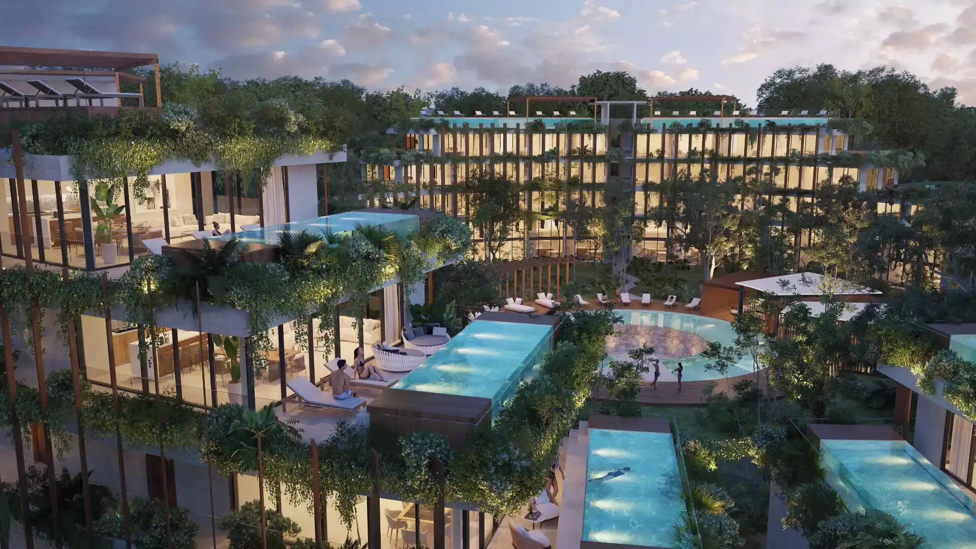 A multi-level resort with outdoor pools, lounge areas, and lush greenery.