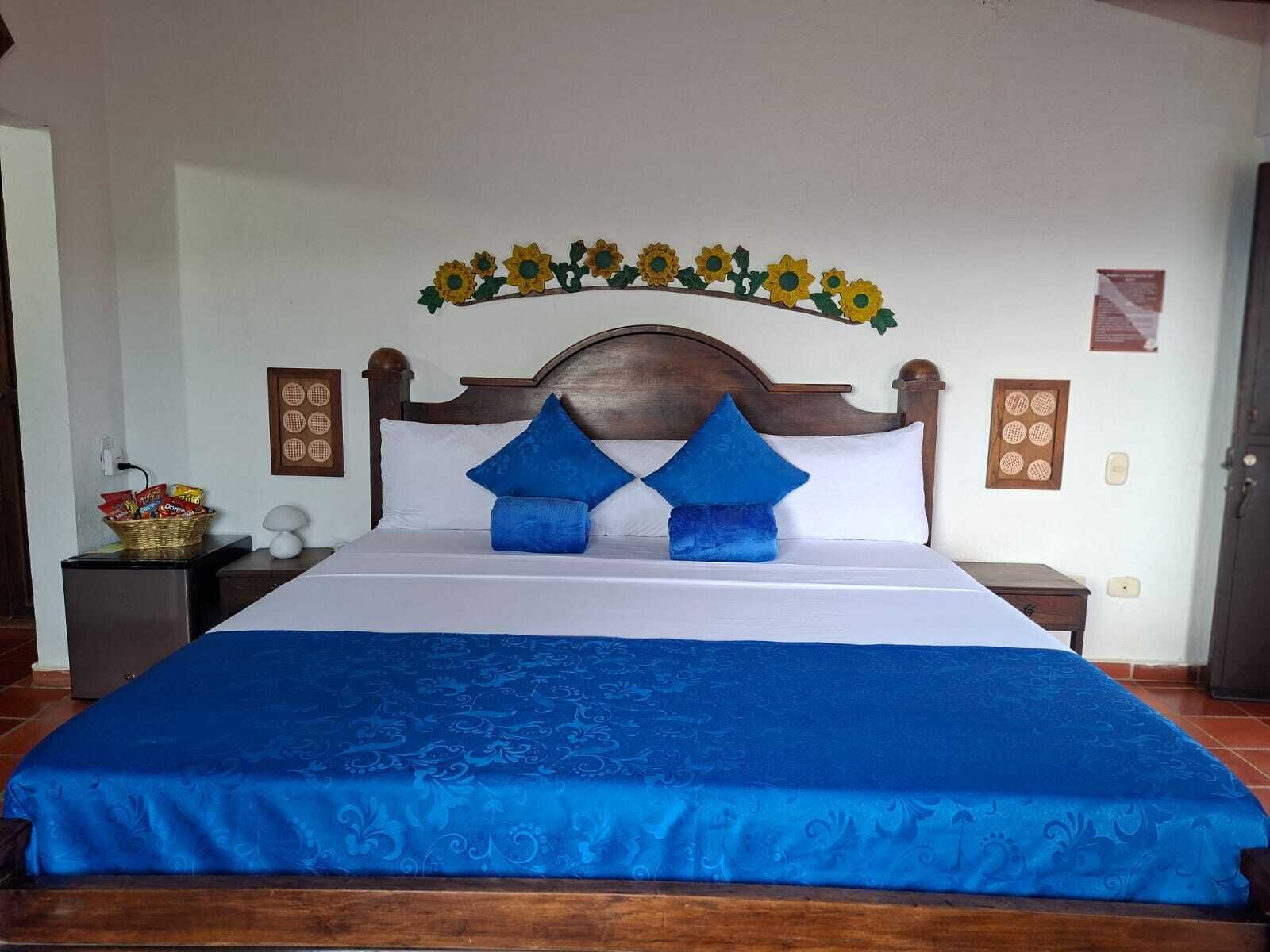 Premium-Vierbettzimmer, Gartenblick | Minibar (mit einigen kostenlosen Artikeln), kostenloses WLAN, Bettwäsche