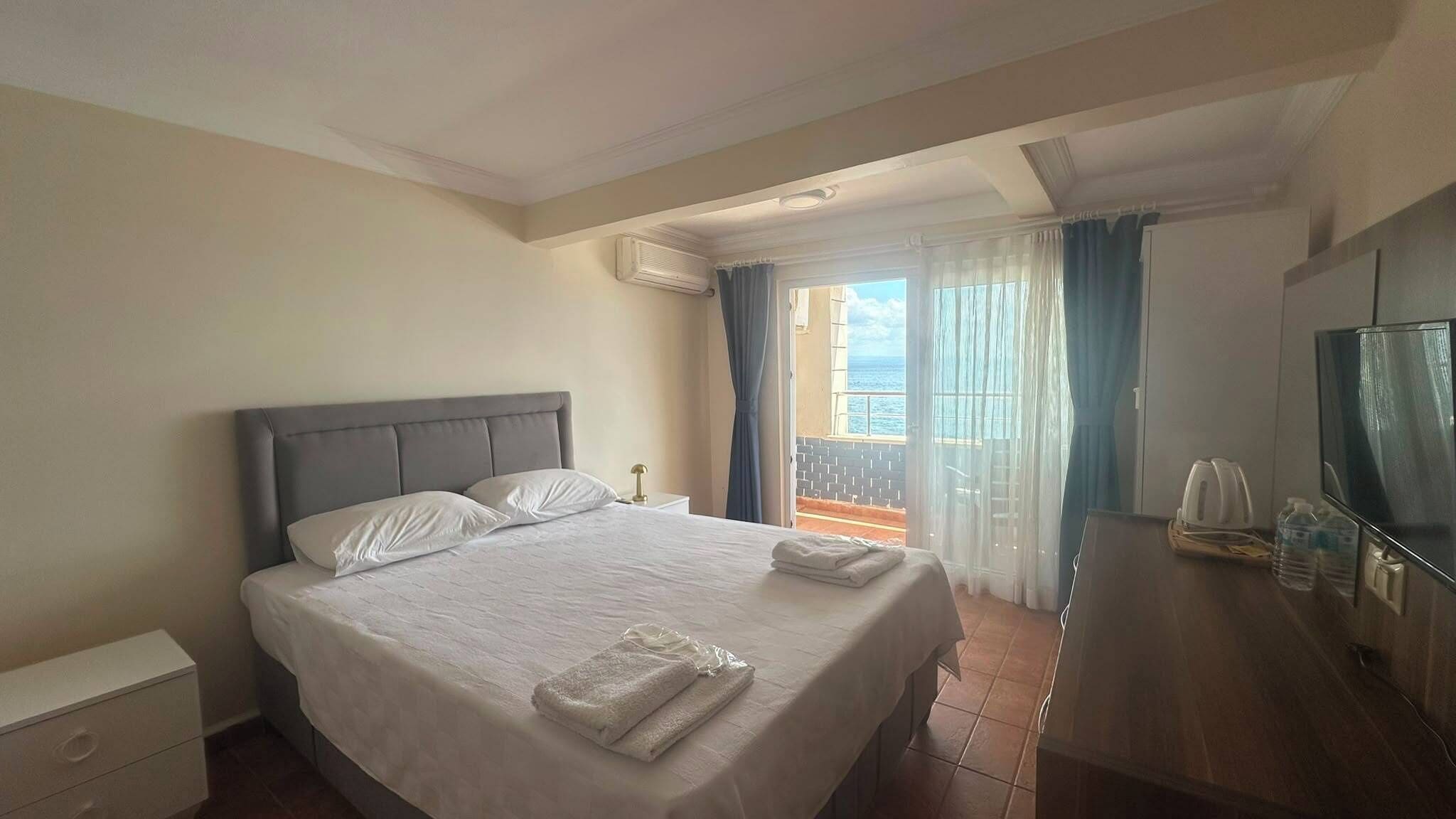 Quarto standard, sacada, vista para o mar | Wi-Fi de cortesia