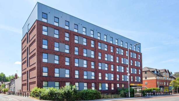 A multi-story building with a brick facade and large windows. - Student Only Berkshire House (Reading)