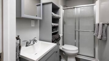 Shower, towels, soap, shampoo