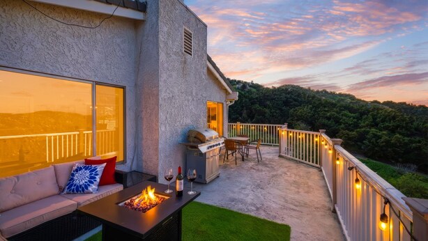 An outdoor patio with a fire feature, seating, and a grill. - Natures Escape - Game Room, Spa, Sauna, OMG Views! (Escondido)