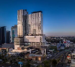 A high-rise building with multiple balconies and a modern architectural design. - Apartment in the Andares Financial District (Zapopan)