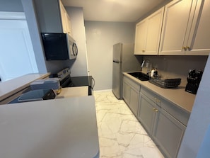 Private kitchen -     Spacious Modern Apartment, Queen Bed • Twin Beds • Sofa Bed (Midland)