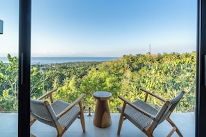 Suite de luxe, vistes al mar | Interior