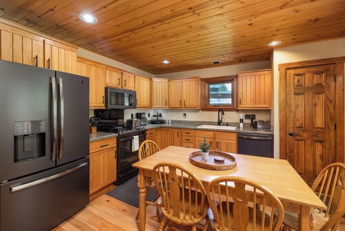 New! Riverfront retreat! Wood Stove! Large Porch!