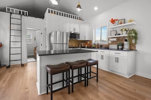 Coffee/tea maker, fridge, microwave, oven