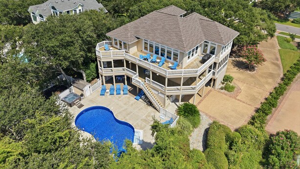 Exterior - Soundfront golf retreat with pool, hot tub, game room, and 5 bedrooms. (Corolla)