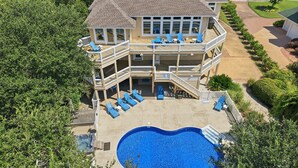 Exterior - Soundfront golf retreat with pool, hot tub, game room, and 5 bedrooms. (Corolla)