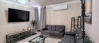 Modern Apartment with 100% Air Conditioning • King-Size Beds