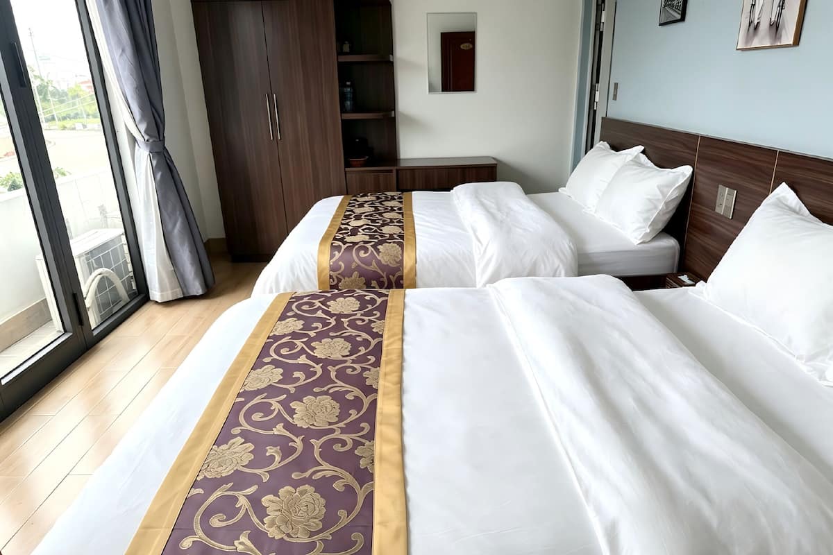 Habitación Confort con 2 camas individuales, para fumadores, vista al lago | Wifi gratis y ropa de cama